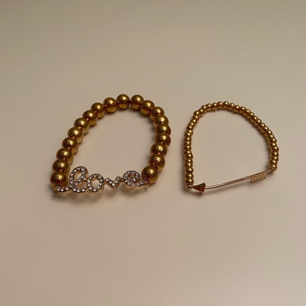 Set of 2 gold bead love bracelets